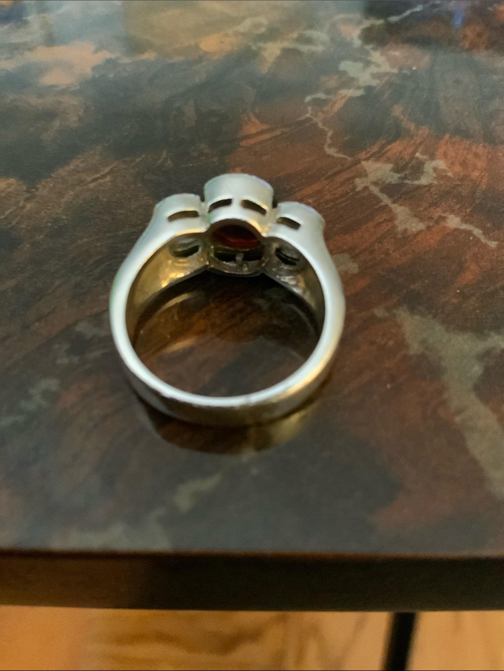 Sterling Silver Ring Garnet Center Stone and CZ Side Stones. - Picture 3 of 3